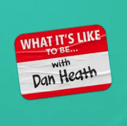 Teal square with name tag sticker that says "what it's like to be..." in white letters on red background and "with Dan Heath" on white background